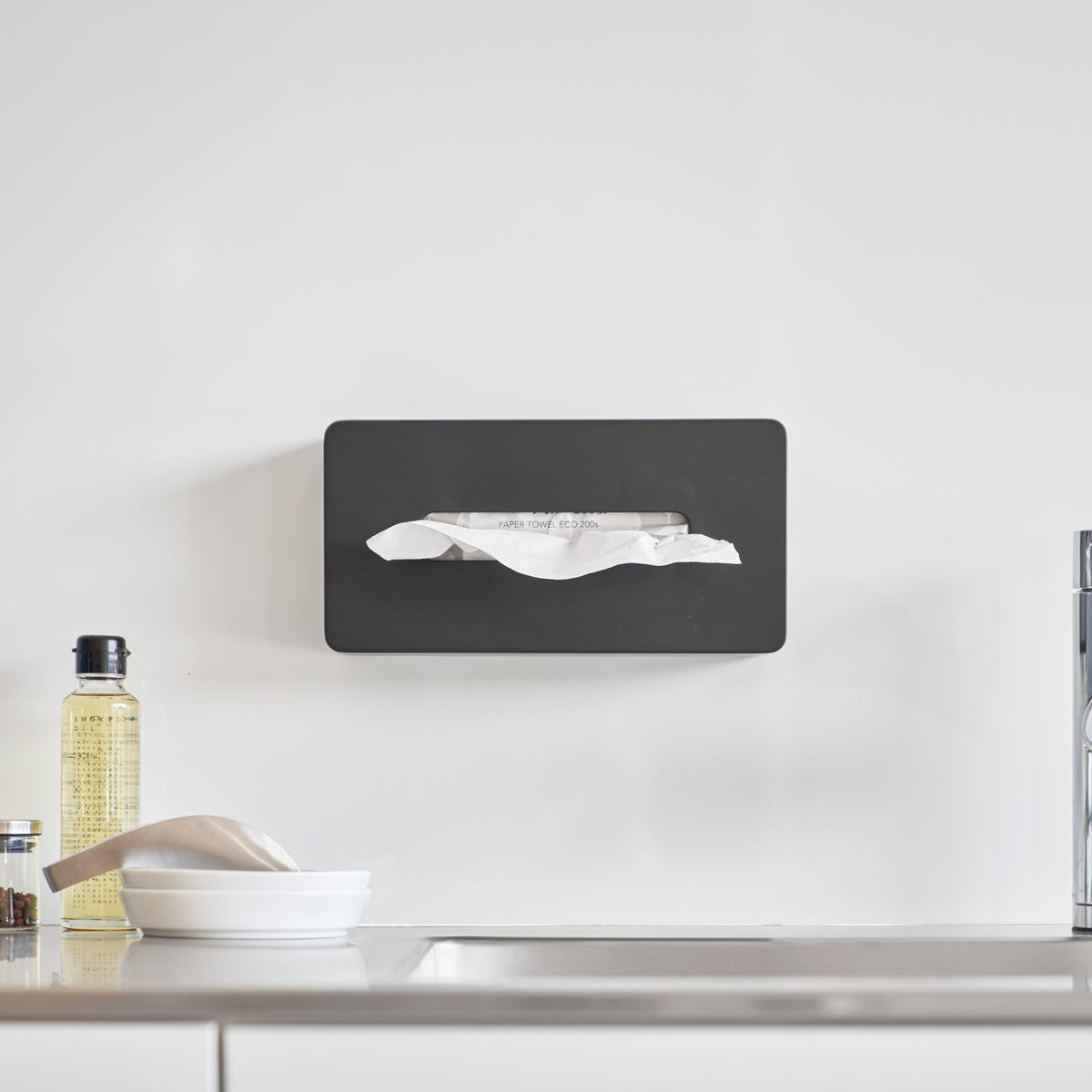 Estuche autoadhesivo para pañuelos de papel