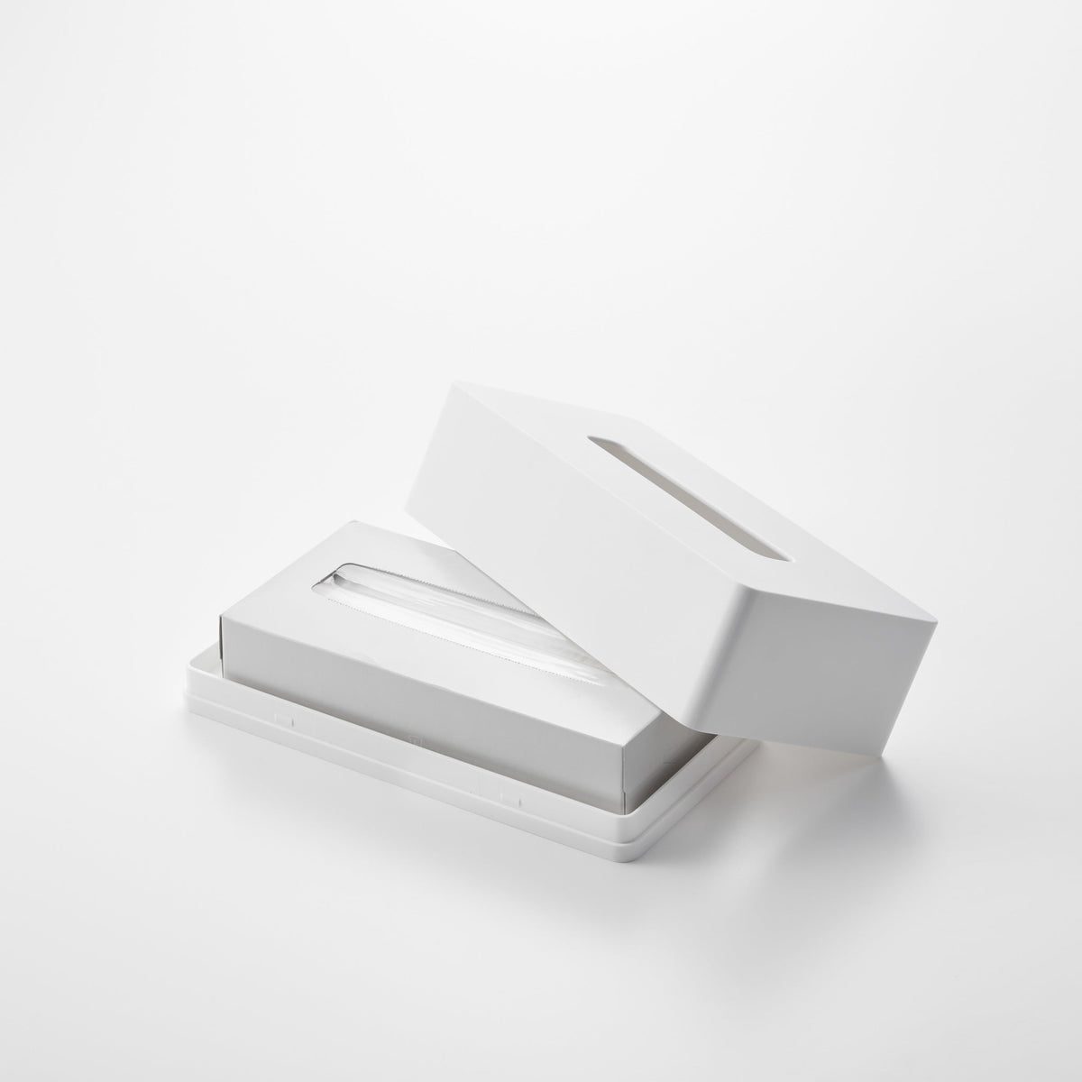 Estuche autoadhesivo para pañuelos de papel